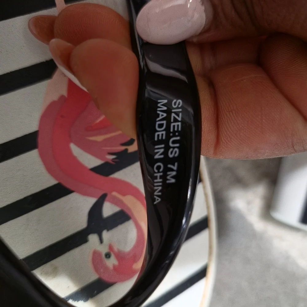 kate spade Black Striped Flip Flops with Pink Flamingo Print